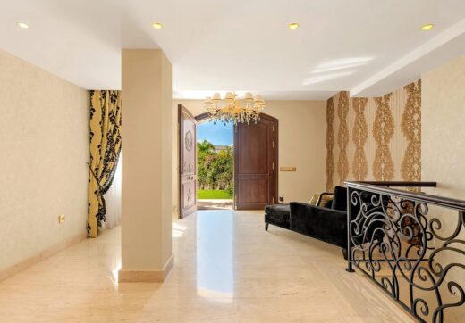 Nestled within the prestigious El Herrojo community, this 7-bedroom, 9-bathroom villa redefines opulent living.