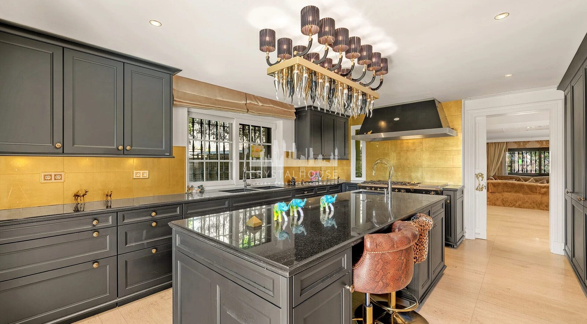 Nestled within the prestigious El Herrojo community, this 7-bedroom, 9-bathroom villa redefines opulent living.