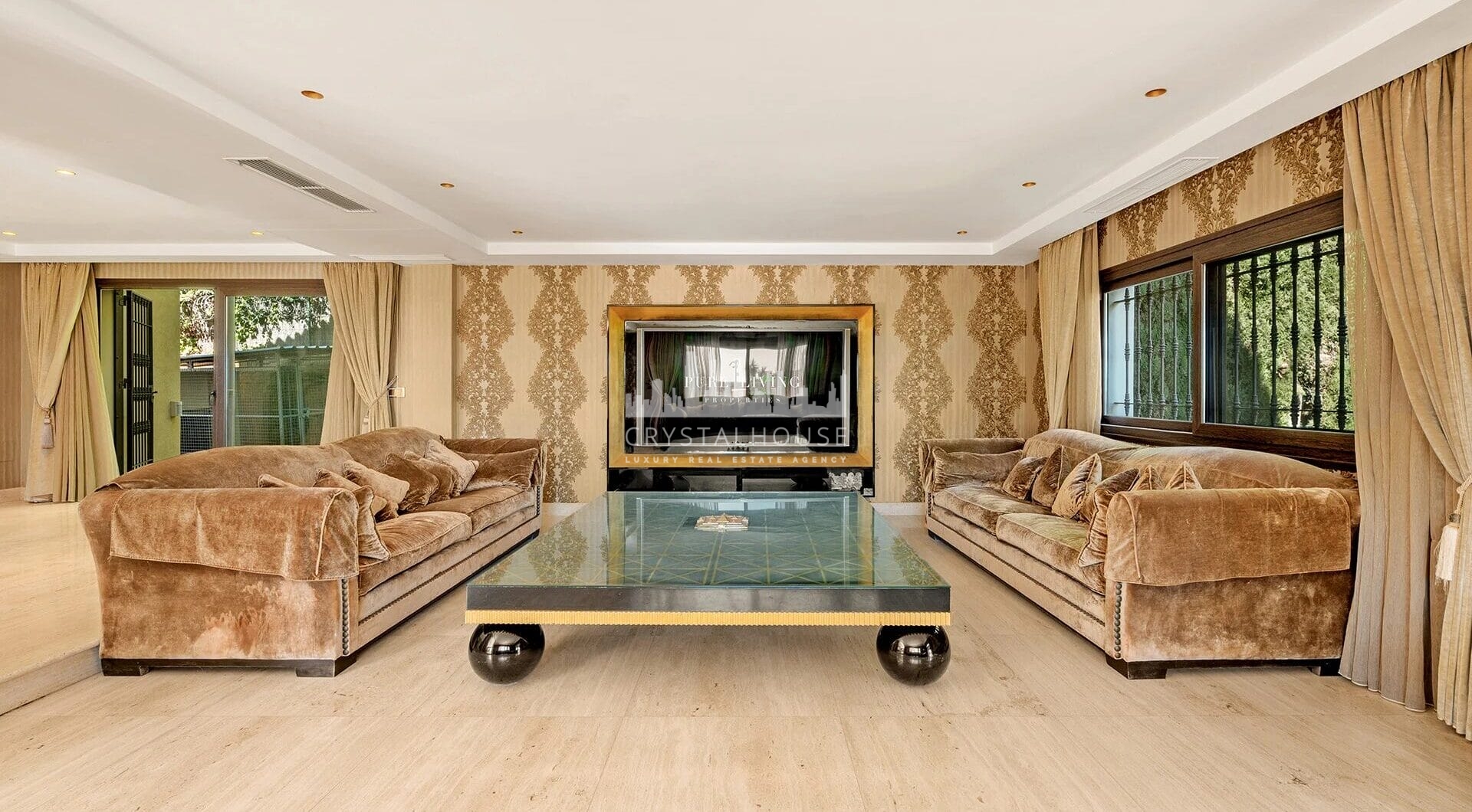 Nestled within the prestigious El Herrojo community, this 7-bedroom, 9-bathroom villa redefines opulent living.