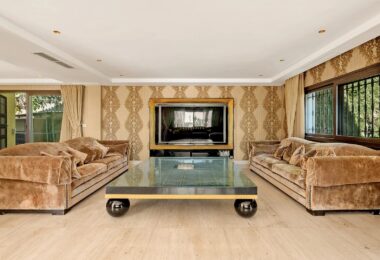 Nestled within the prestigious El Herrojo community, this 7-bedroom, 9-bathroom villa redefines opulent living.
