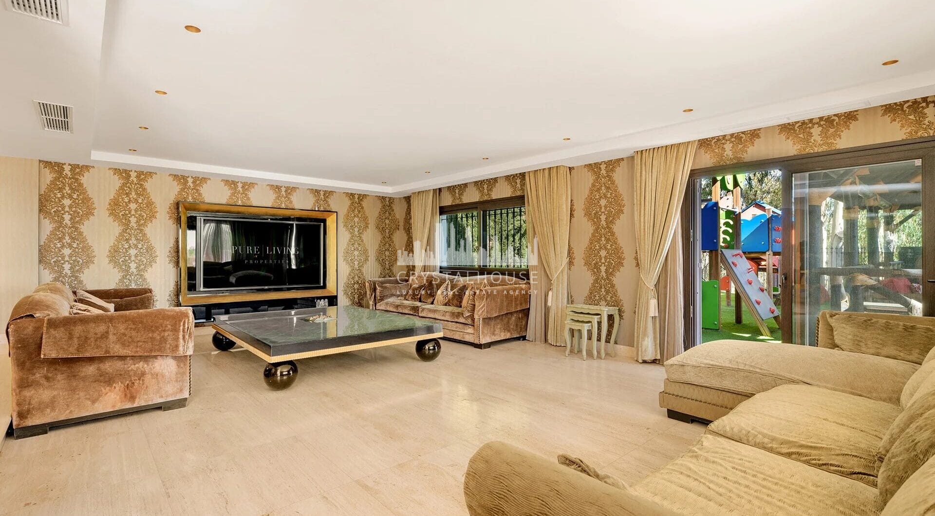 Nestled within the prestigious El Herrojo community, this 7-bedroom, 9-bathroom villa redefines opulent living.