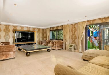 Nestled within the prestigious El Herrojo community, this 7-bedroom, 9-bathroom villa redefines opulent living.