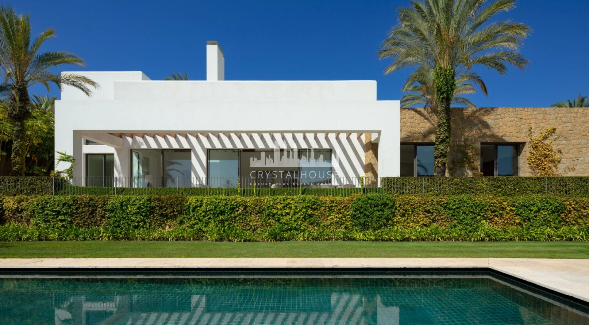Nestled in the exclusive Green 10 are within the prestigious Finca Cortesin Resort, this magnificent villa showcases captivating architecture that offers a contemporary twist on golfside living.