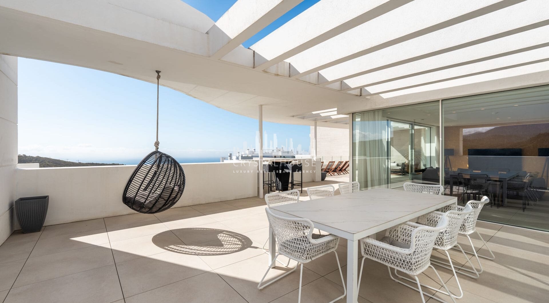 Located in the gated community of Palo Alto, this southeast-facing penthouse offers sea, mountain, and panoramic views from a private setting above Marbella.