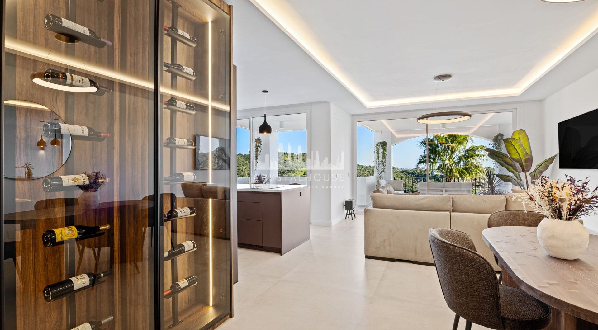 Positioned in the serene hills of Benahavís, this three-bedroom apartment offers elevated living within the secure Altos de la Quinta enclave.