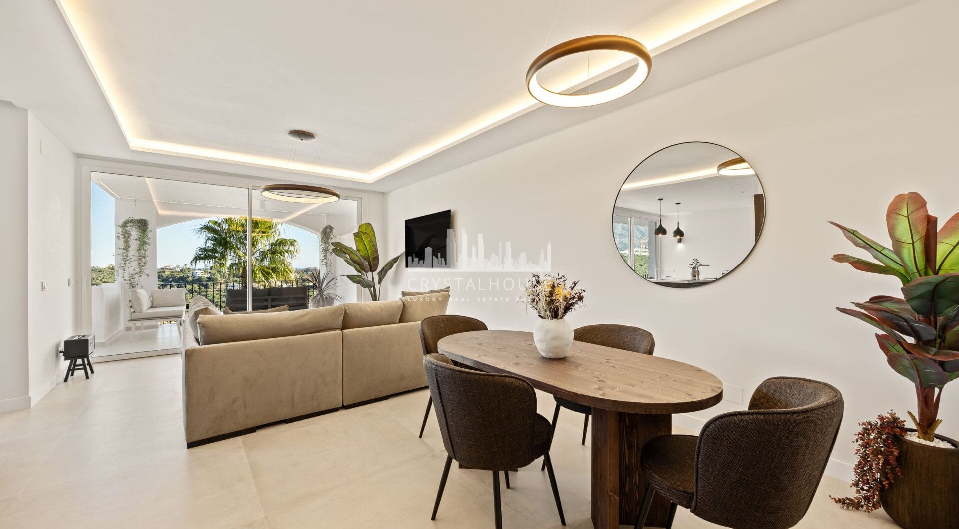 Positioned in the serene hills of Benahavís, this three-bedroom apartment offers elevated living within the secure Altos de la Quinta enclave.