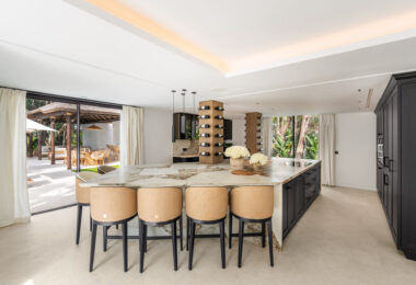 Villa Las Palmeras is a home that combines modern features with traditional details, creating a warm and inviting atmosphere.