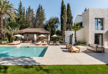 Villa Las Palmeras is a home that combines modern features with traditional details, creating a warm and inviting atmosphere.