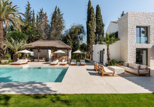 Villa Las Palmeras is a home that combines modern features with traditional details, creating a warm and inviting atmosphere.