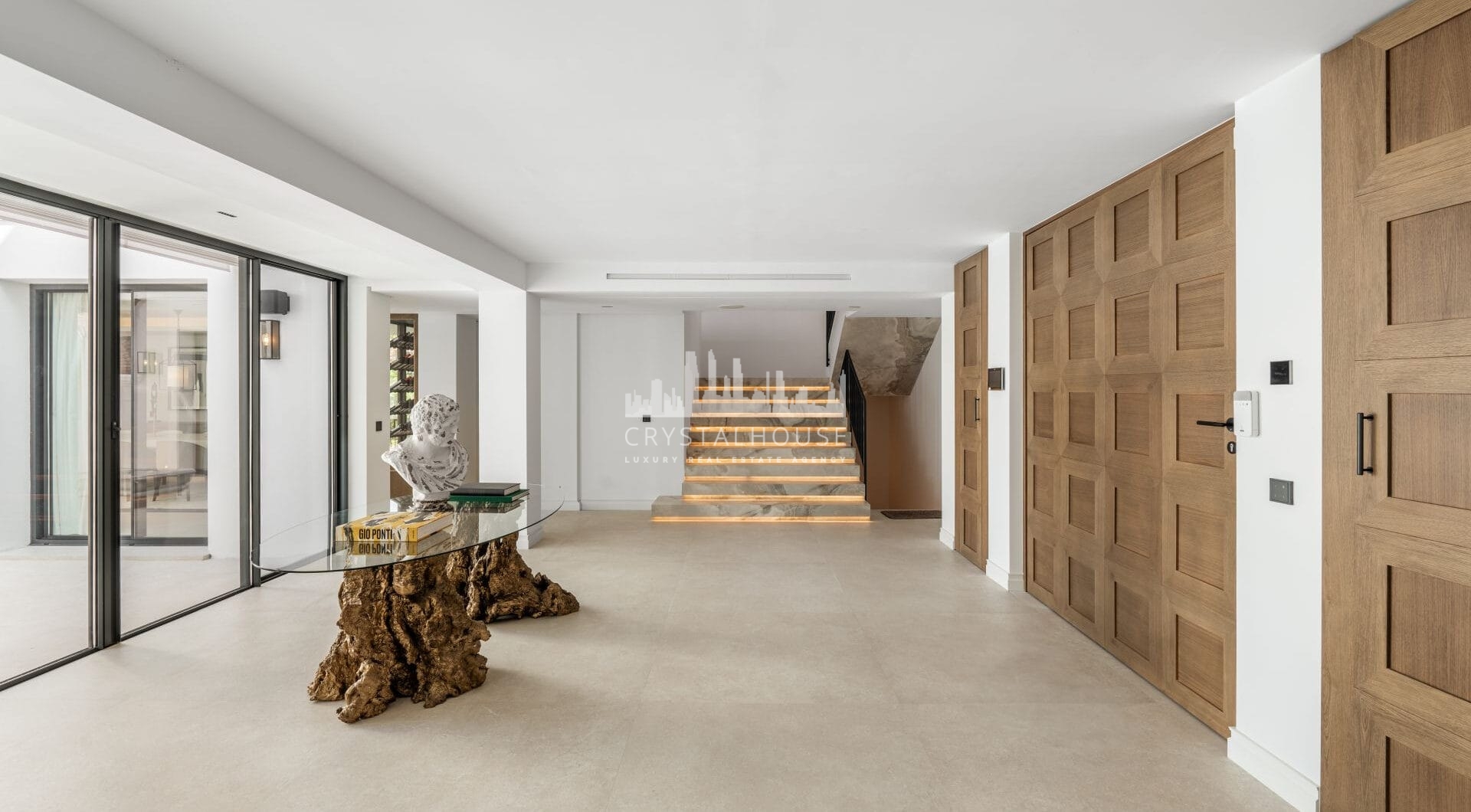 Villa Las Palmeras is a home that combines modern features with traditional details, creating a warm and inviting atmosphere.