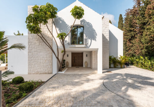 Villa Las Palmeras is a home that combines modern features with traditional details, creating a warm and inviting atmosphere.