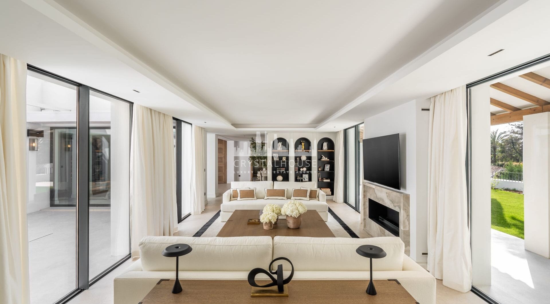 Villa Las Palmeras is a home that combines modern features with traditional details, creating a warm and inviting atmosphere.