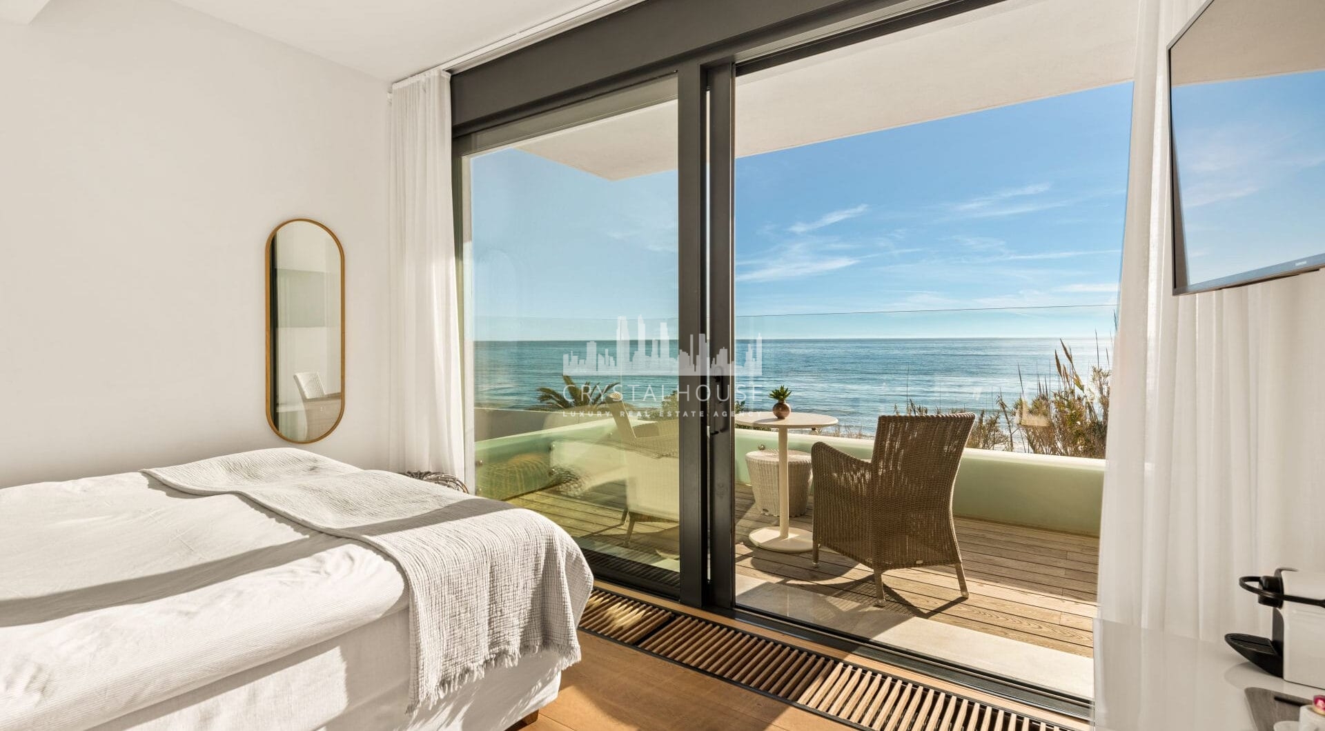 This beachfront villa in Costabella is all about location. Sitting right on the golden sands, it offers direct access to the beach through a private path.