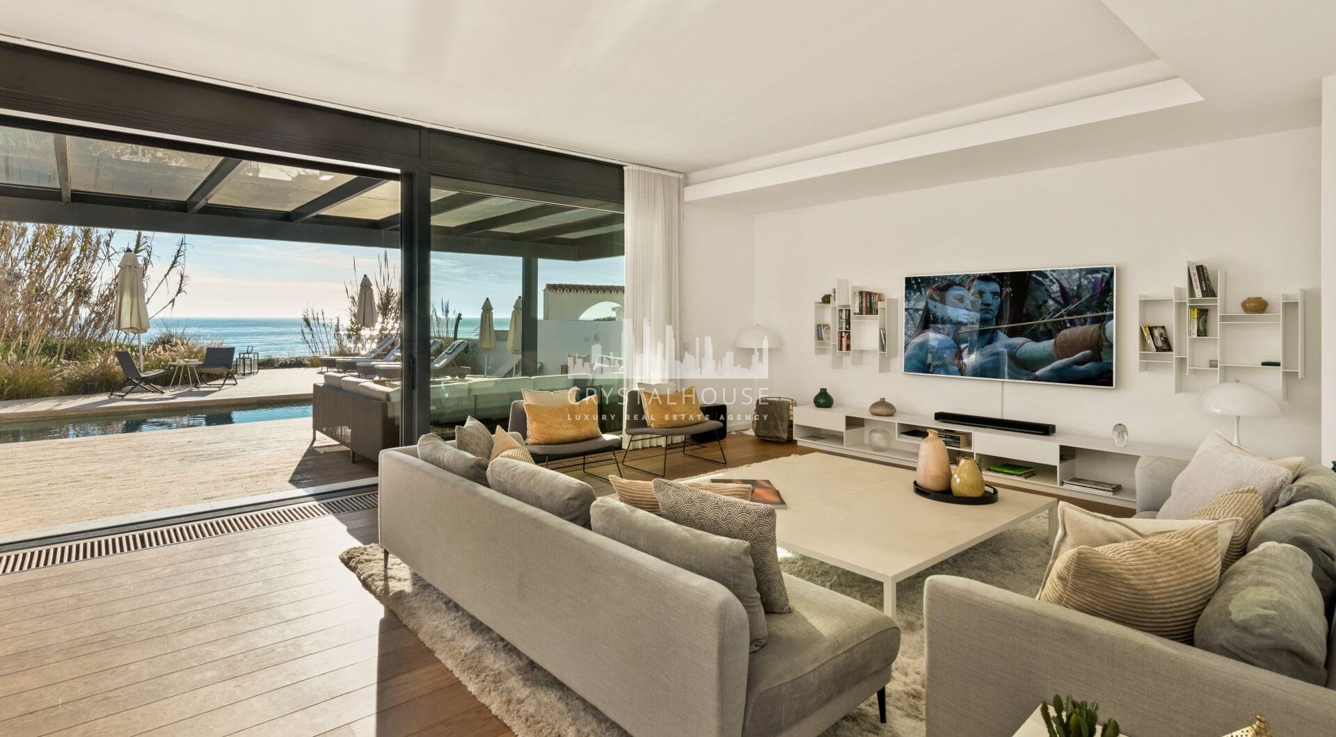 This beachfront villa in Costabella is all about location. Sitting right on the golden sands, it offers direct access to the beach through a private path.