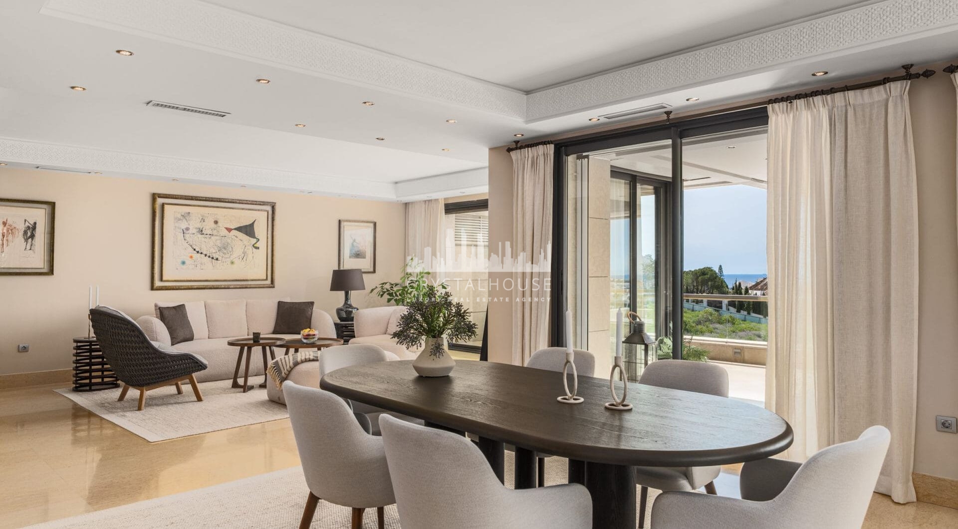 This expansive duplex penthouse is located within the prestigious Los Arrayanes residential complex, in the peaceful and elevated Supermanzana JKL area of Nueva Andalucía.