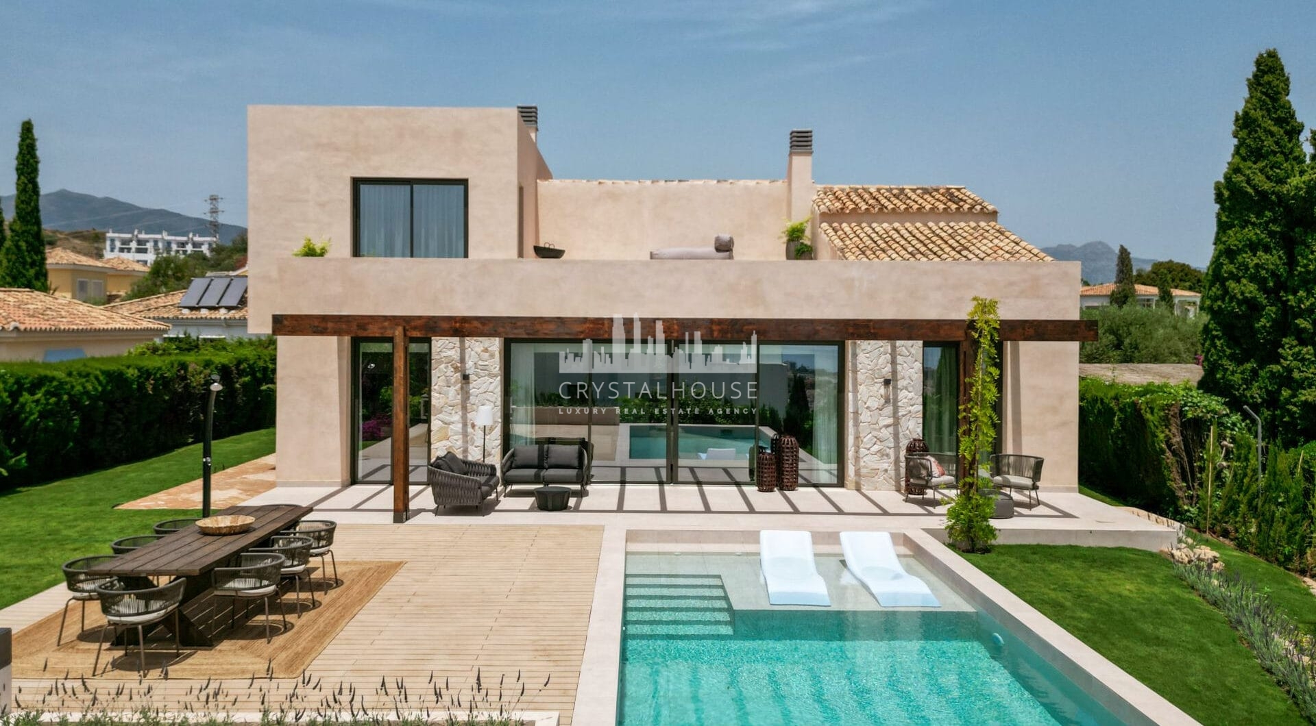 This elegant 4-bedroom villa for sale in Paraiso Alto, Benahavis, offers a beautifully designed modern retreat inspired by Mediterranean architecture.