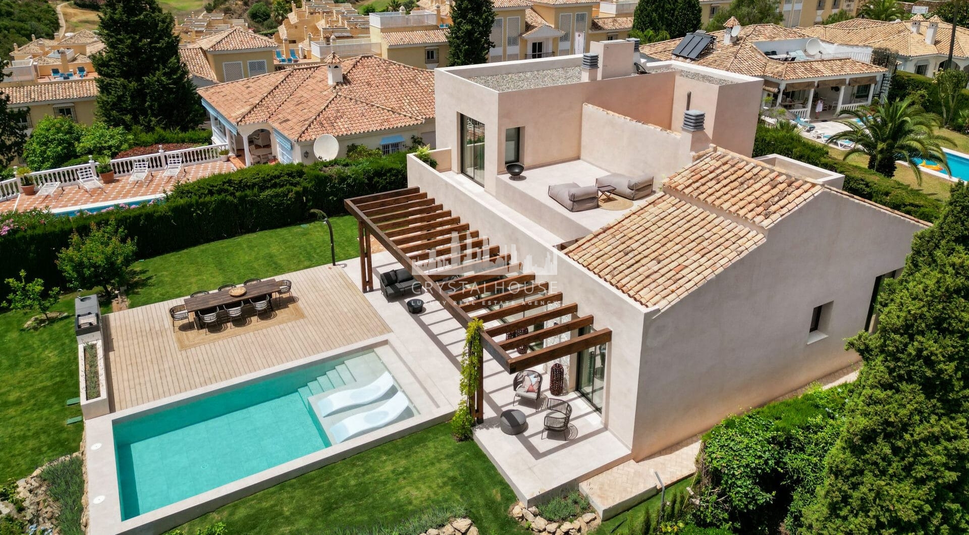 This elegant 4-bedroom villa for sale in Paraiso Alto, Benahavis, offers a beautifully designed modern retreat inspired by Mediterranean architecture.