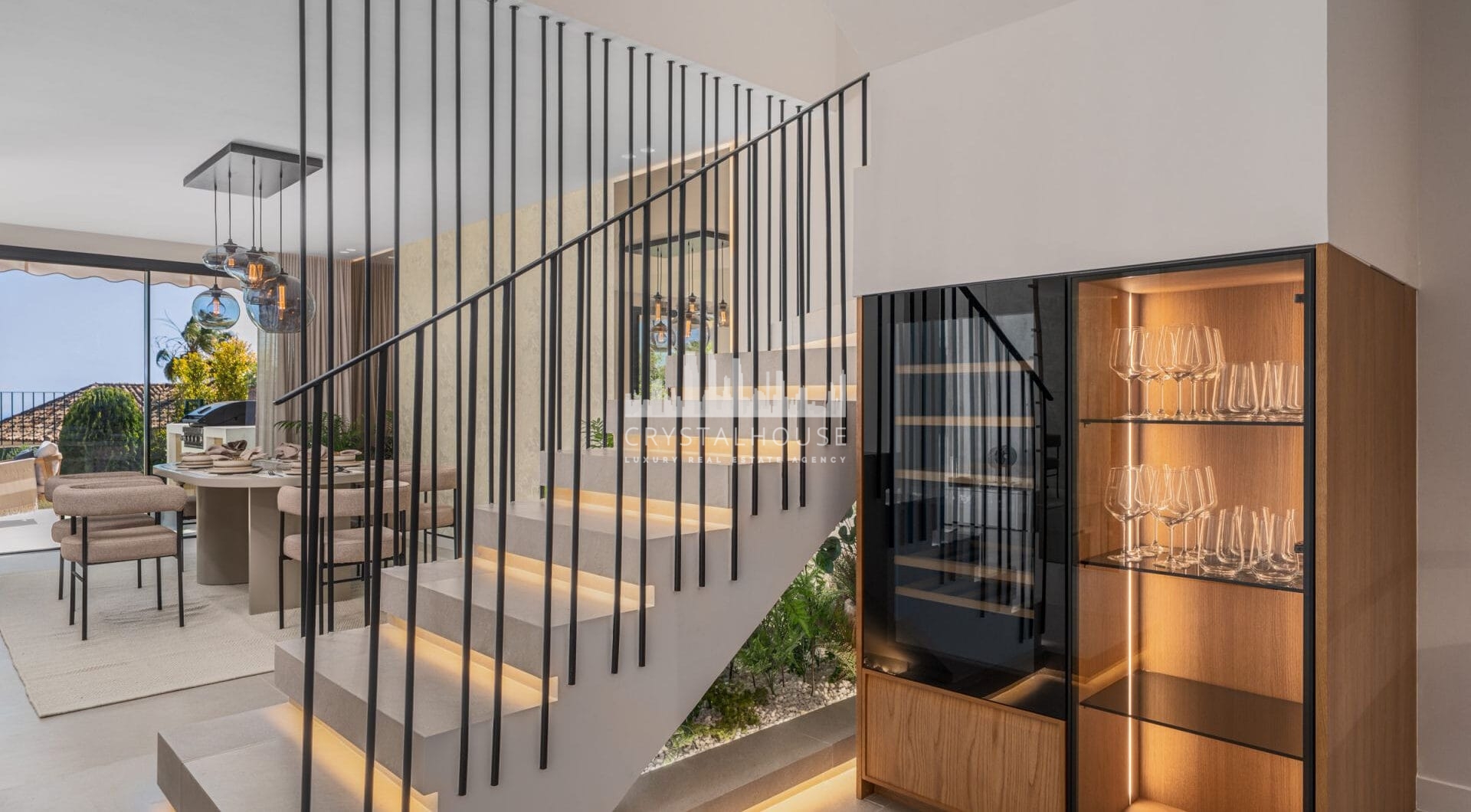 Maison Vue is a meticulously renovated three-level townhouse for sale located in the secure, well-maintained community of La Quinta Hills in Benahavís.