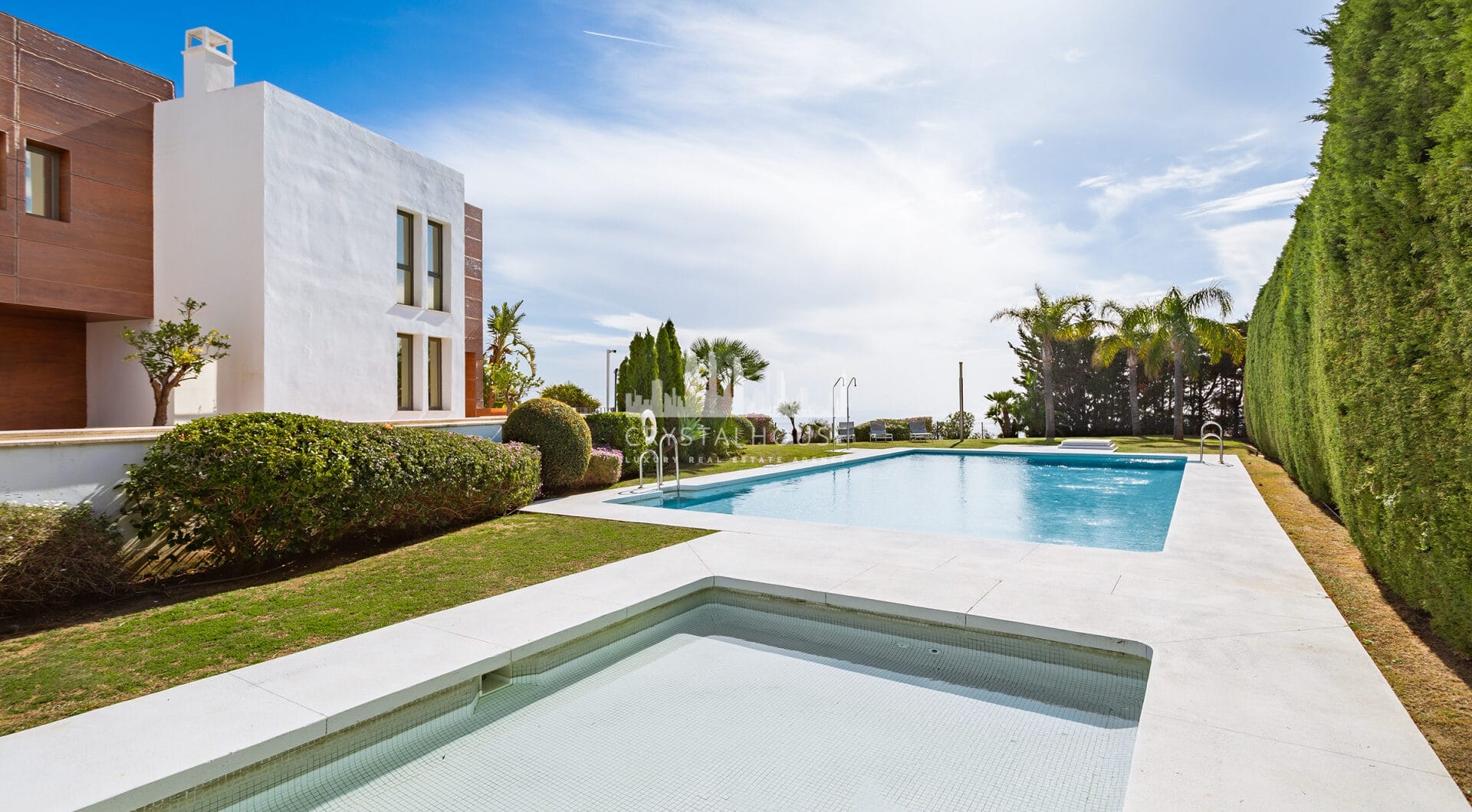 Modern semi-detached villa in La Alqueria, Mijas, within a private gated complex of just 8 homes.