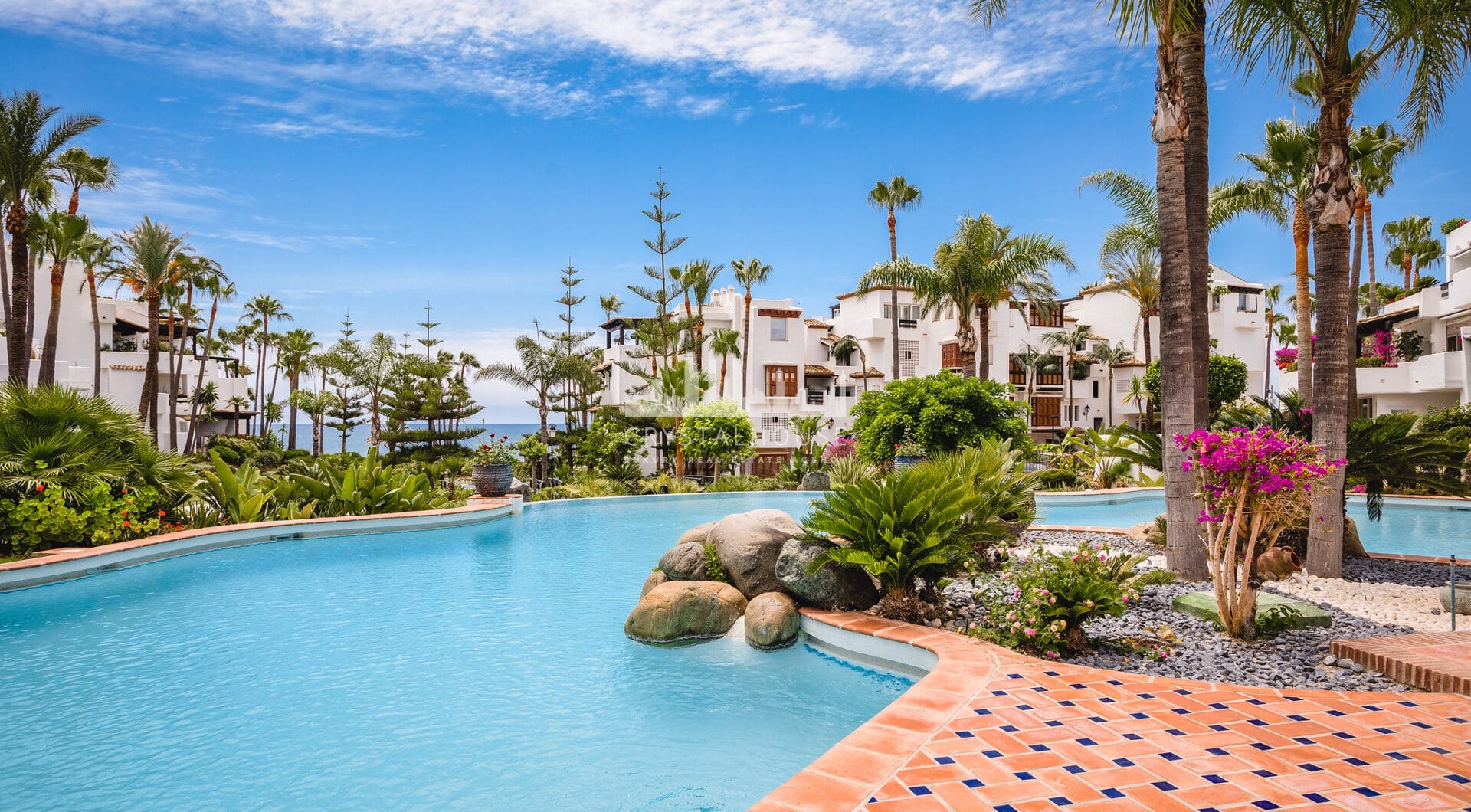 Fully renovated southwest-facing luxury apartment in Japanese Gardens, Marina Puente Romano.