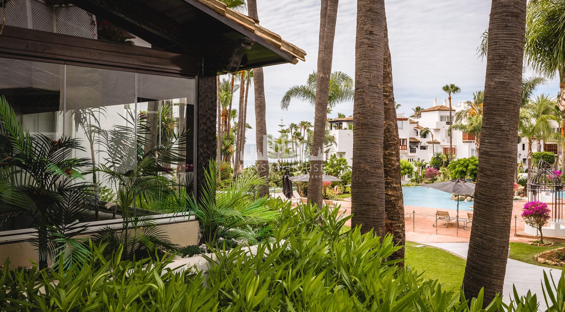 Fully renovated southwest-facing luxury apartment in Japanese Gardens, Marina Puente Romano.