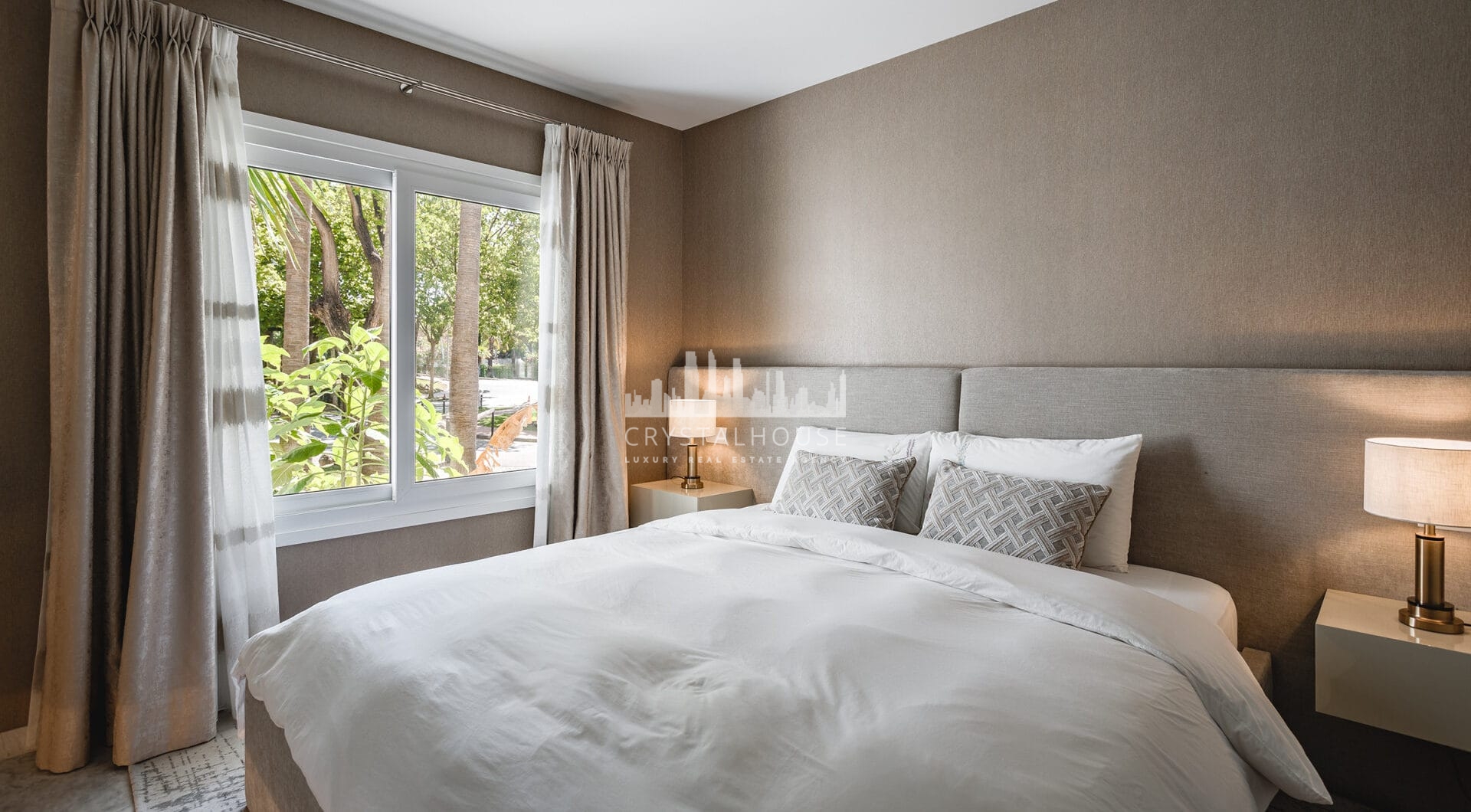 Fully renovated southwest-facing luxury apartment in Japanese Gardens, Marina Puente Romano.