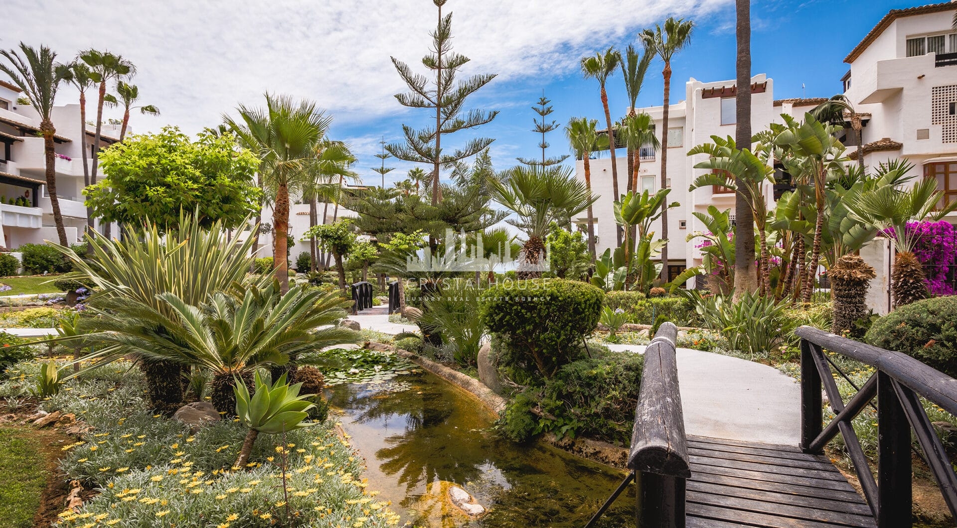 Fully renovated southwest-facing luxury apartment in Japanese Gardens, Marina Puente Romano.