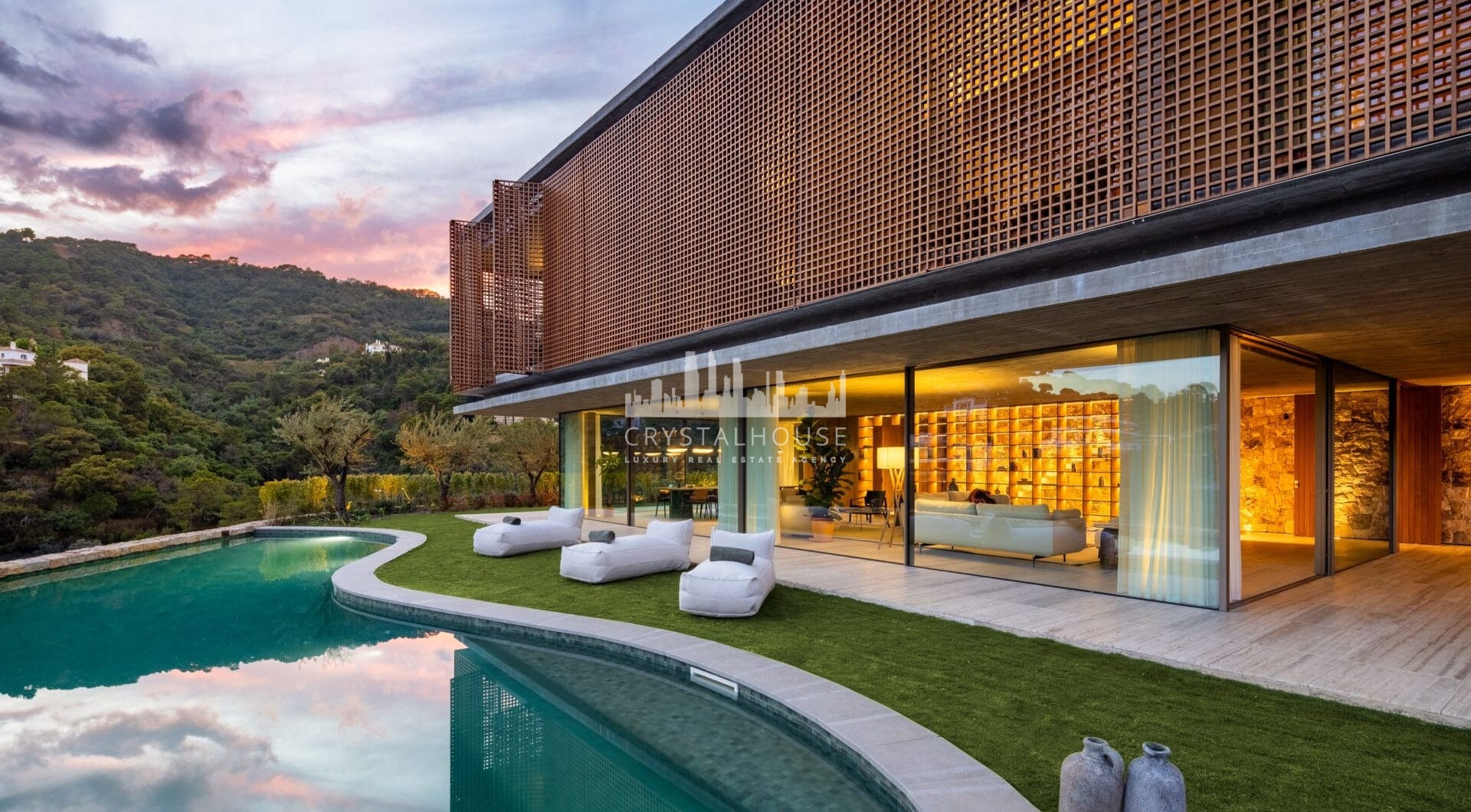 Villa Sienna is a contemporary home for sale in the exclusive gated community of El Madroñal, a peaceful and sought-after area in the hills of Marbella.
