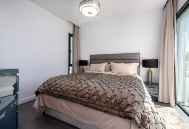 This contemporary four-bedroom detached villa, located in Atalaya Isdabe, is a perfect blend of comfort and luxury