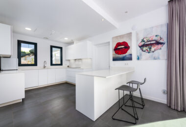 This contemporary four-bedroom detached villa, located in Atalaya Isdabe, is a perfect blend of comfort and luxury