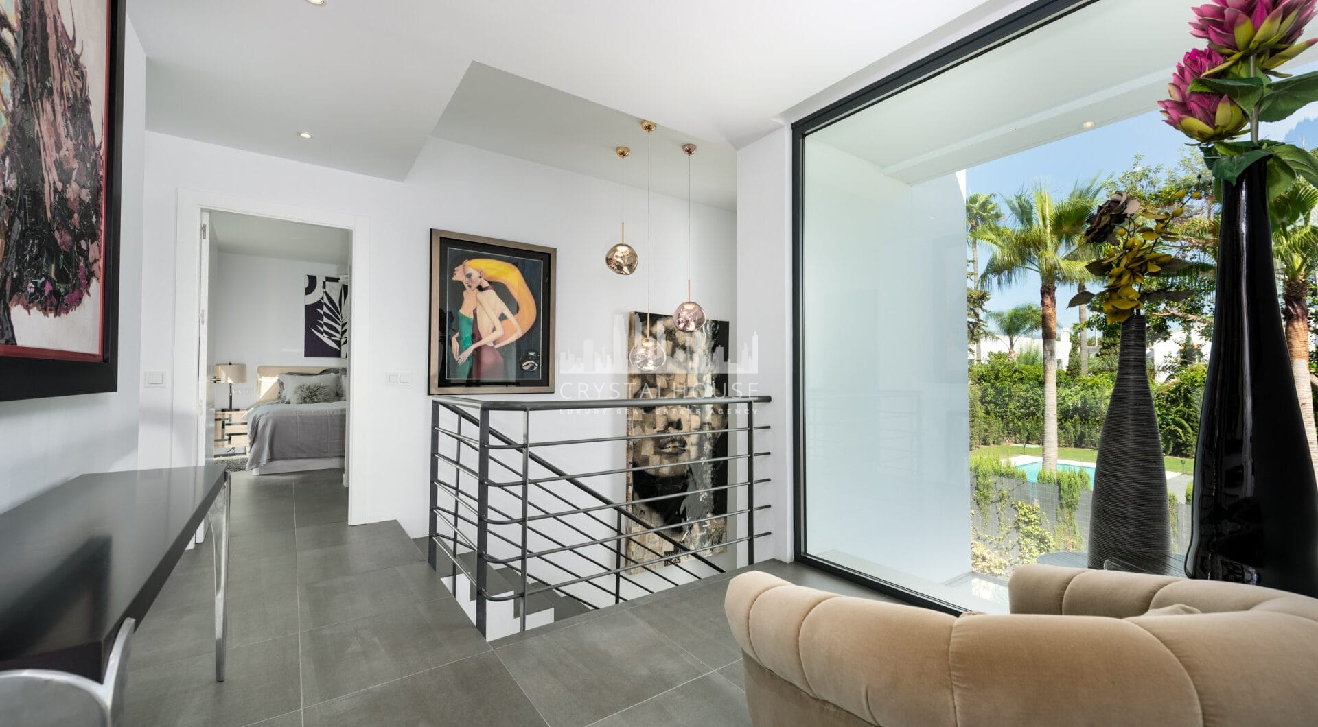 This contemporary four-bedroom detached villa, located in Atalaya Isdabe, is a perfect blend of comfort and luxury