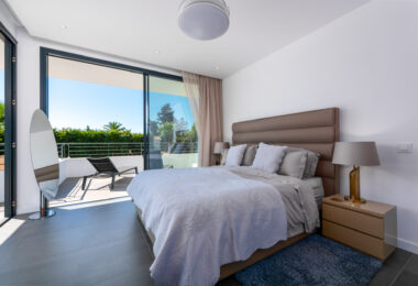 This contemporary four-bedroom detached villa, located in Atalaya Isdabe, is a perfect blend of comfort and luxury