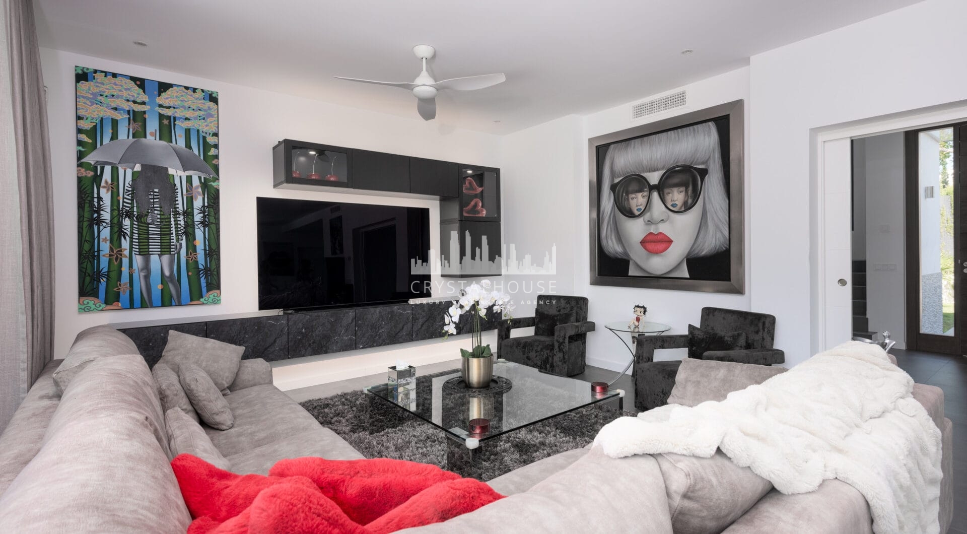 This contemporary four-bedroom detached villa, located in Atalaya Isdabe, is a perfect blend of comfort and luxury