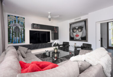 This contemporary four-bedroom detached villa, located in Atalaya Isdabe, is a perfect blend of comfort and luxury