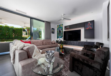 This contemporary four-bedroom detached villa, located in Atalaya Isdabe, is a perfect blend of comfort and luxury