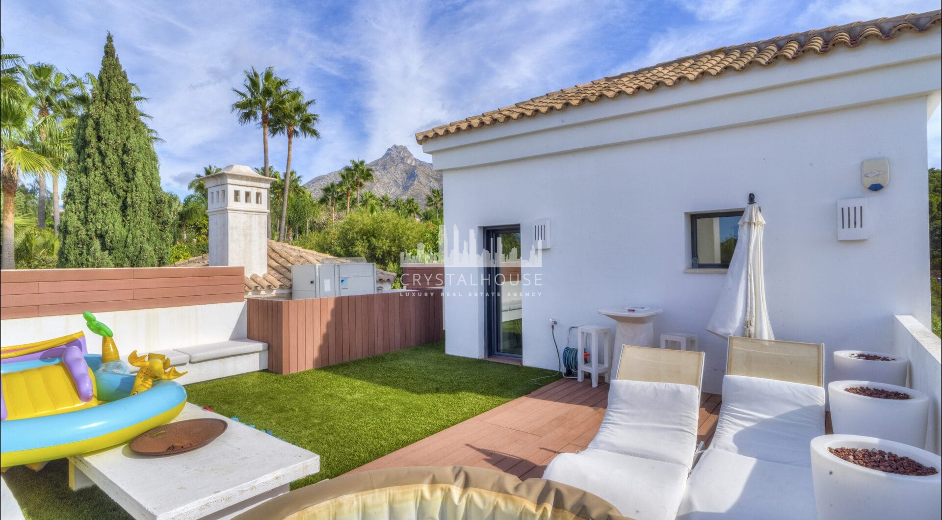 Magnificent five-bedroom, south-facing villa situated in the prestigious Village Las Lomas de Magna Marbella with sea views