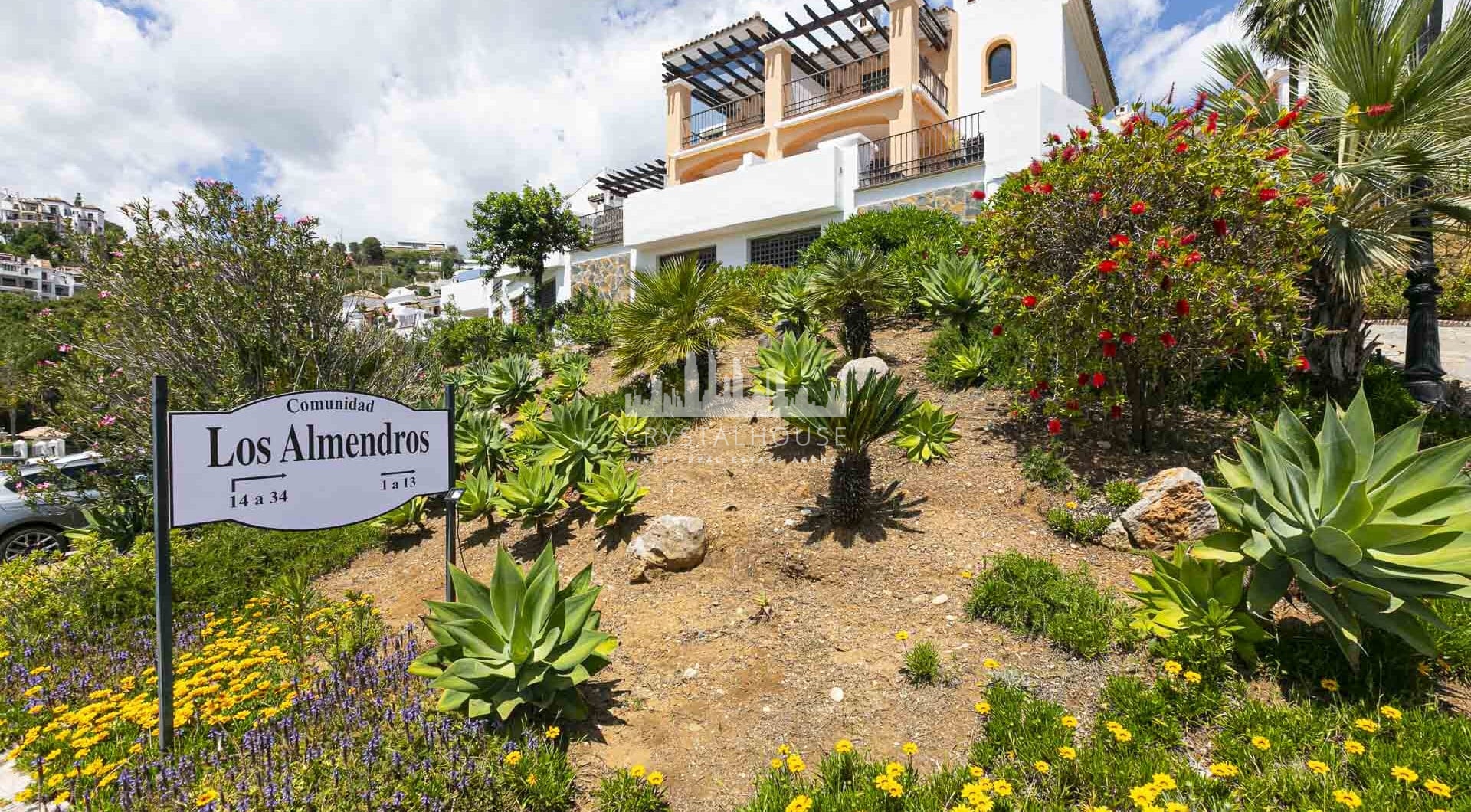 Beautiful south-facing, four bedroom townhouse in Los Almendros, part of the secure Los Arqueros Golf community in Benahavís