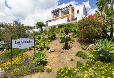 Beautiful south-facing, four bedroom townhouse in Los Almendros, part of the secure Los Arqueros Golf community in Benahavís