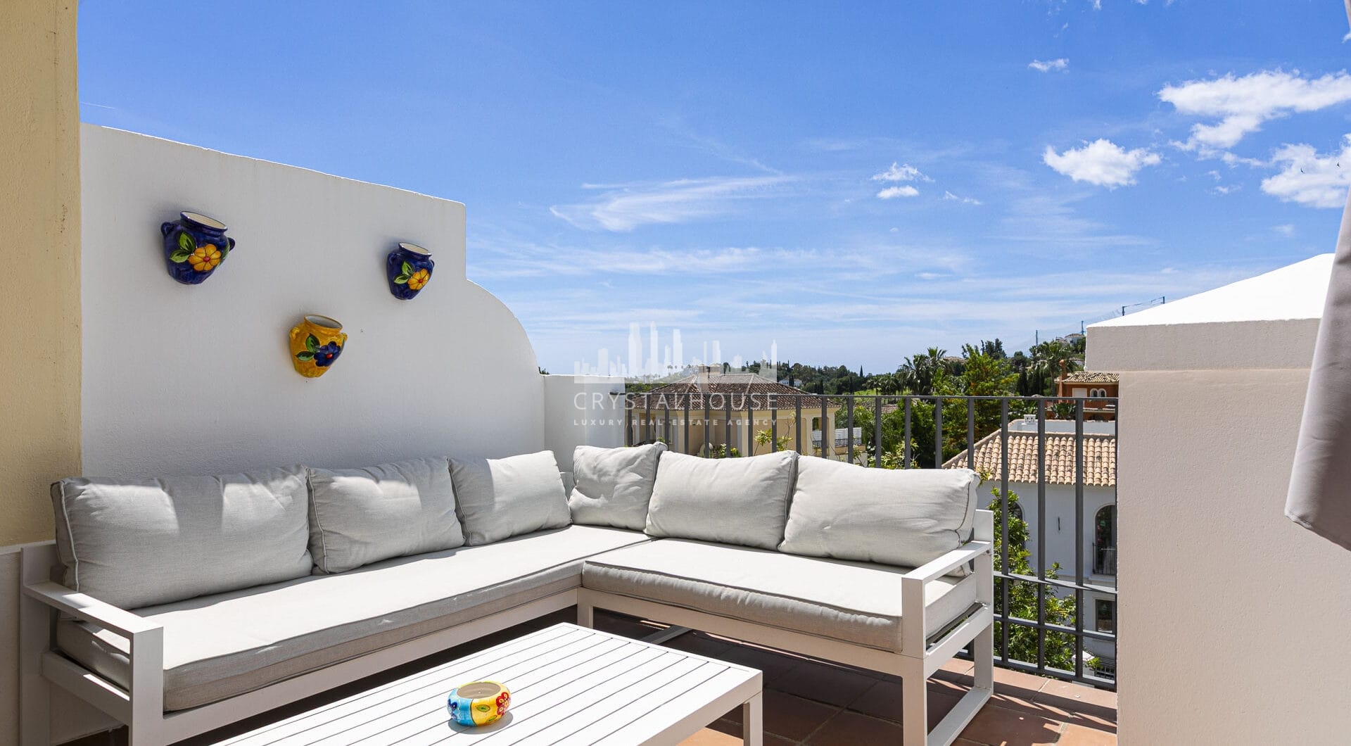 Beautiful south-facing, four bedroom townhouse in Los Almendros, part of the secure Los Arqueros Golf community in Benahavís