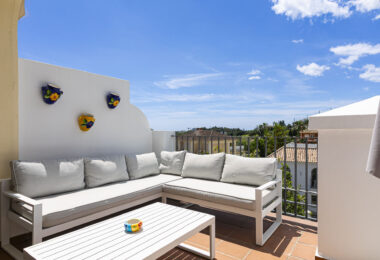 Beautiful south-facing, four bedroom townhouse in Los Almendros, part of the secure Los Arqueros Golf community in Benahavís