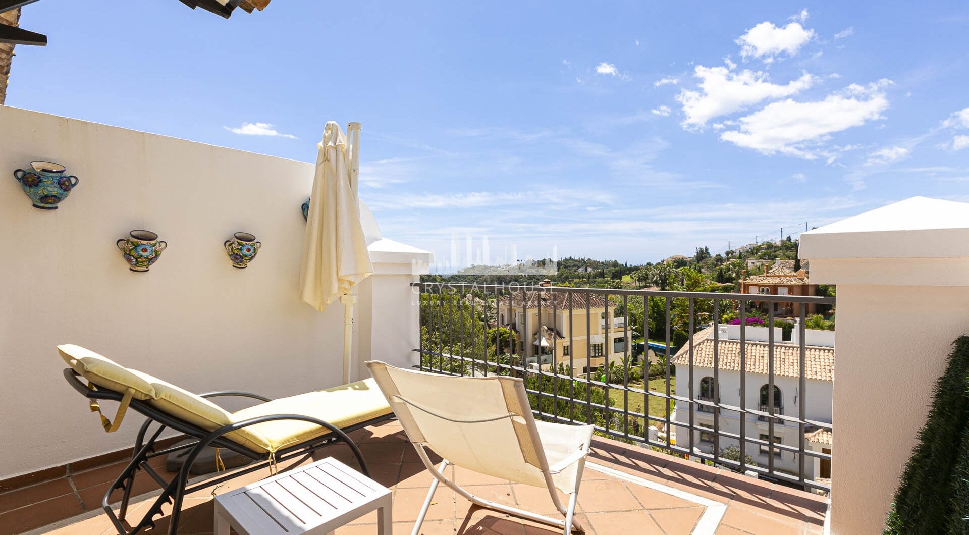 Beautiful south-facing, four bedroom townhouse in Los Almendros, part of the secure Los Arqueros Golf community in Benahavís