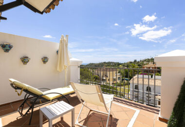 Beautiful south-facing, four bedroom townhouse in Los Almendros, part of the secure Los Arqueros Golf community in Benahavís