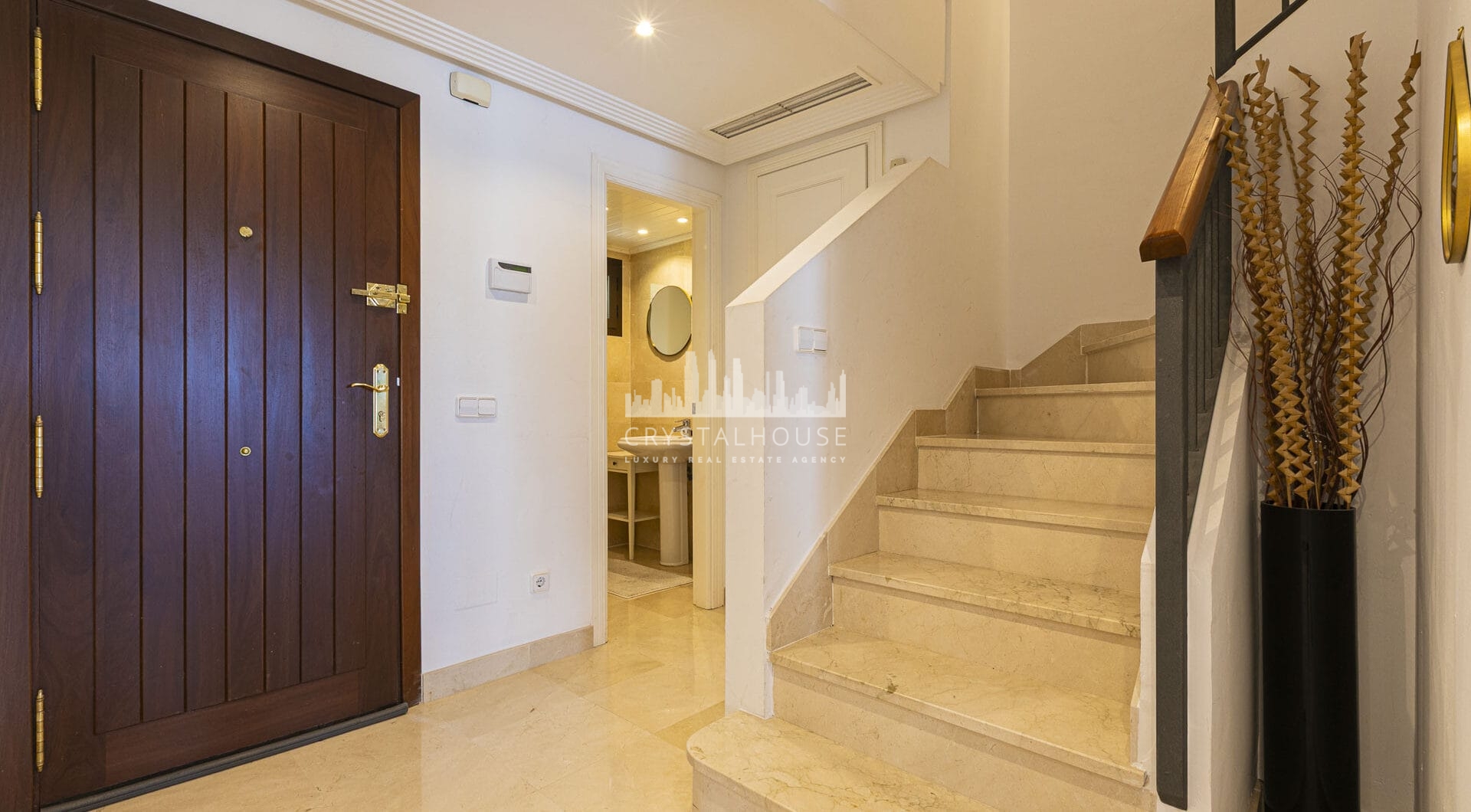 Beautiful south-facing, four bedroom townhouse in Los Almendros, part of the secure Los Arqueros Golf community in Benahavís