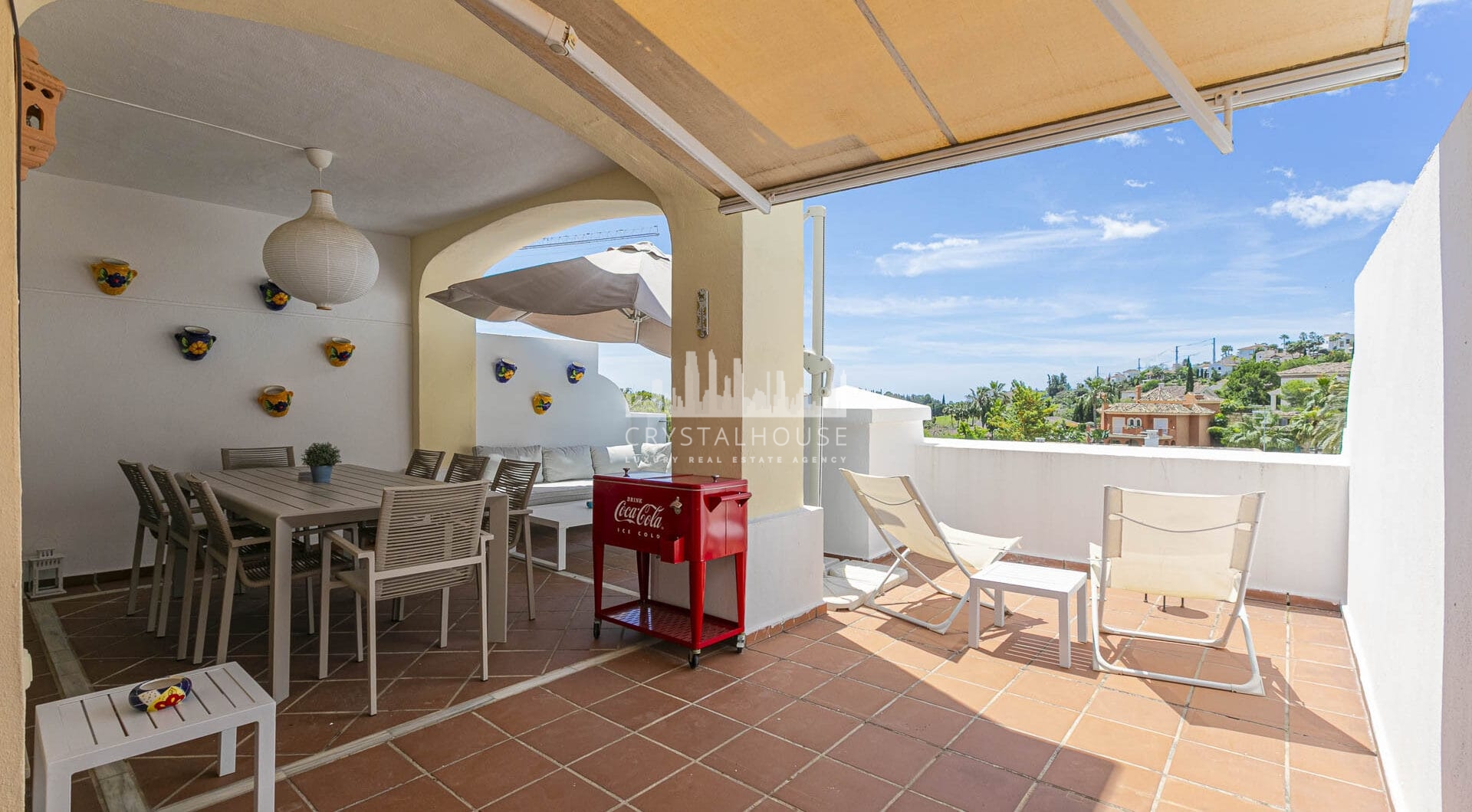Beautiful south-facing, four bedroom townhouse in Los Almendros, part of the secure Los Arqueros Golf community in Benahavís