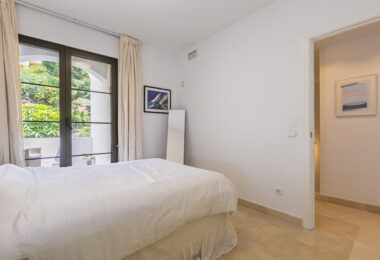 Beautiful south-facing, four bedroom townhouse in Los Almendros, part of the secure Los Arqueros Golf community in Benahavís