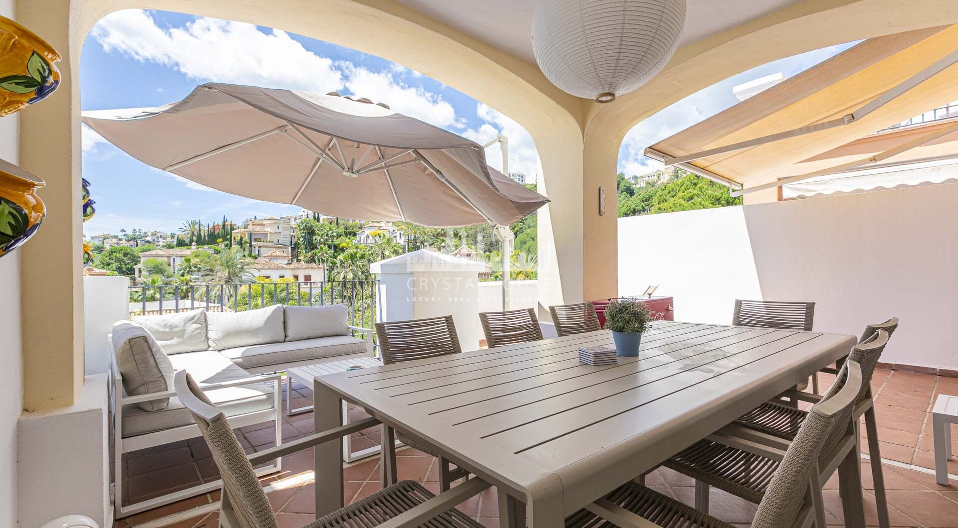 Beautiful south-facing, four bedroom townhouse in Los Almendros, part of the secure Los Arqueros Golf community in Benahavís