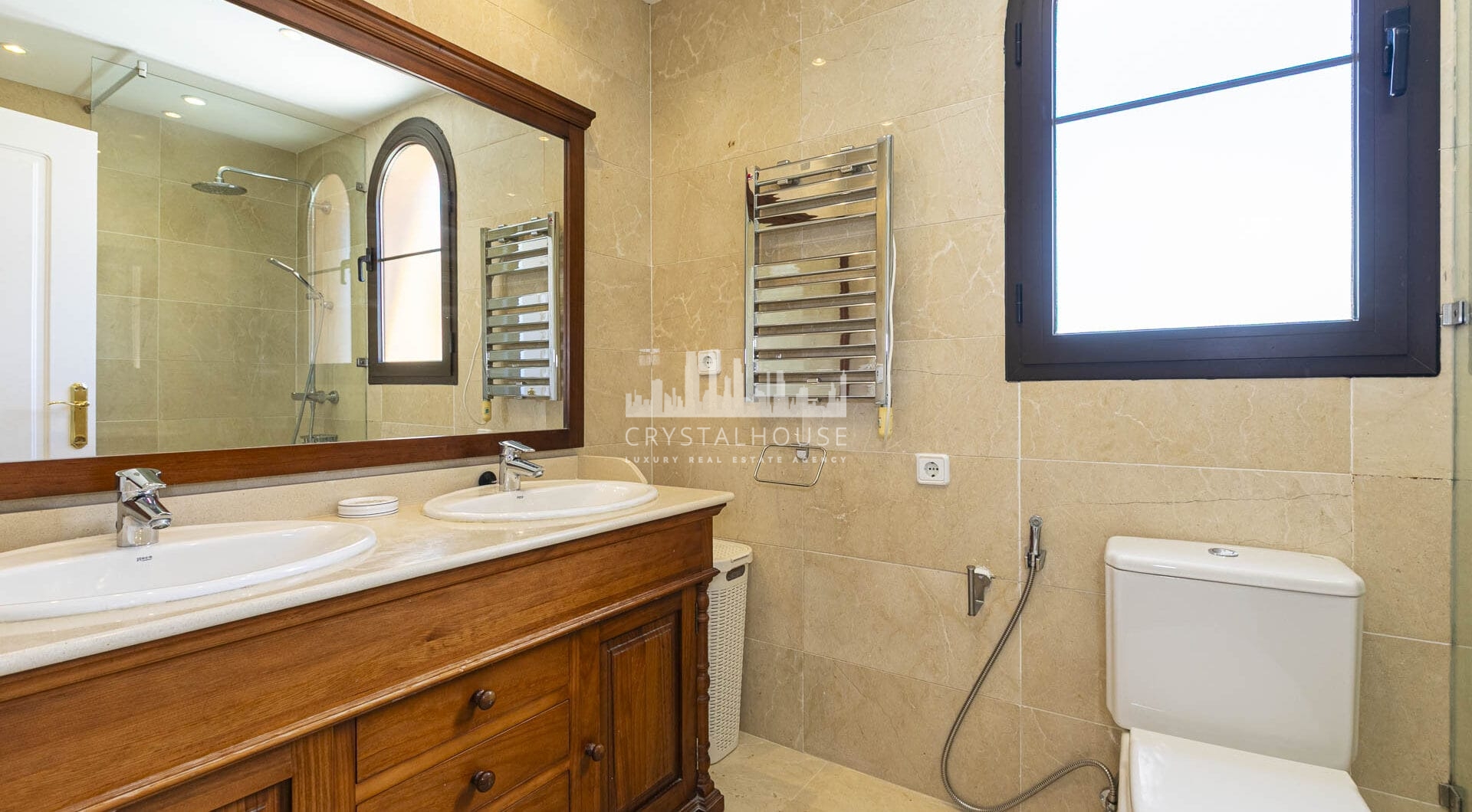 Beautiful south-facing, four bedroom townhouse in Los Almendros, part of the secure Los Arqueros Golf community in Benahavís
