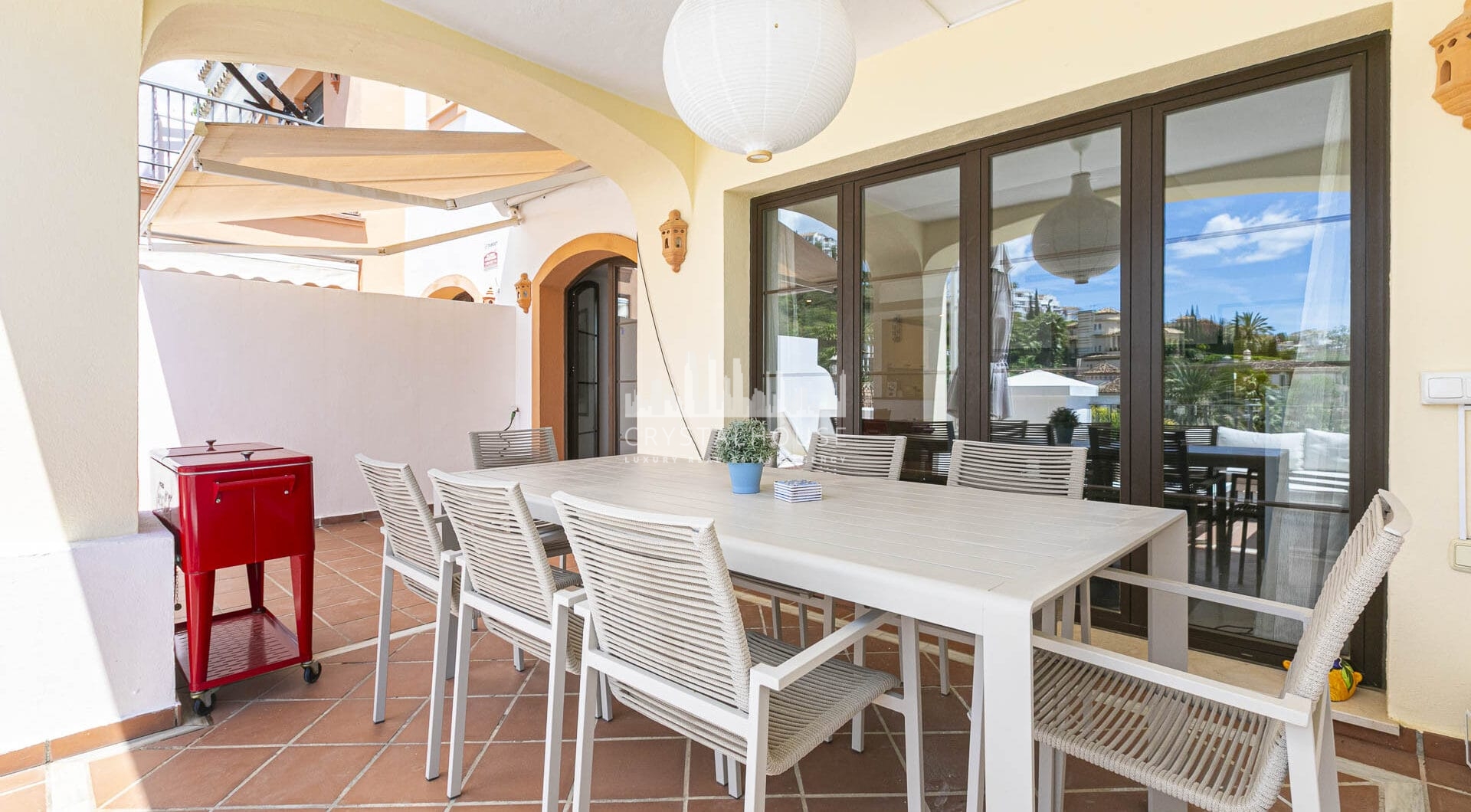 Beautiful south-facing, four bedroom townhouse in Los Almendros, part of the secure Los Arqueros Golf community in Benahavís