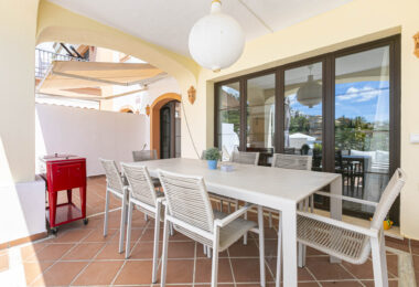 Beautiful south-facing, four bedroom townhouse in Los Almendros, part of the secure Los Arqueros Golf community in Benahavís