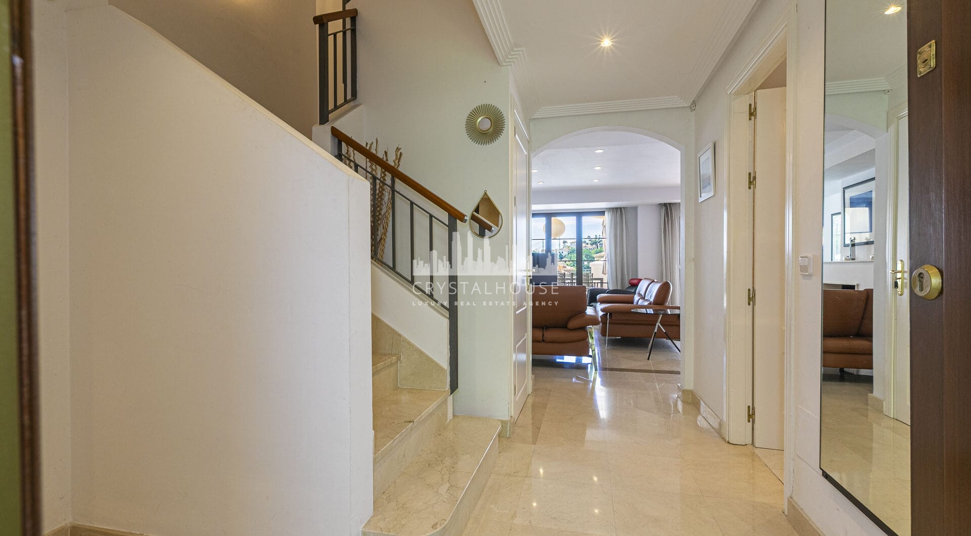Beautiful south-facing, four bedroom townhouse in Los Almendros, part of the secure Los Arqueros Golf community in Benahavís